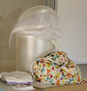 Seau à langes, filet et sac de transport Seau à langes, filet et sac de transport